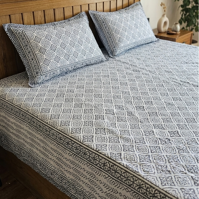 King size everyday cotton bedsheet featuring traditional handblock look geometric pattern in black