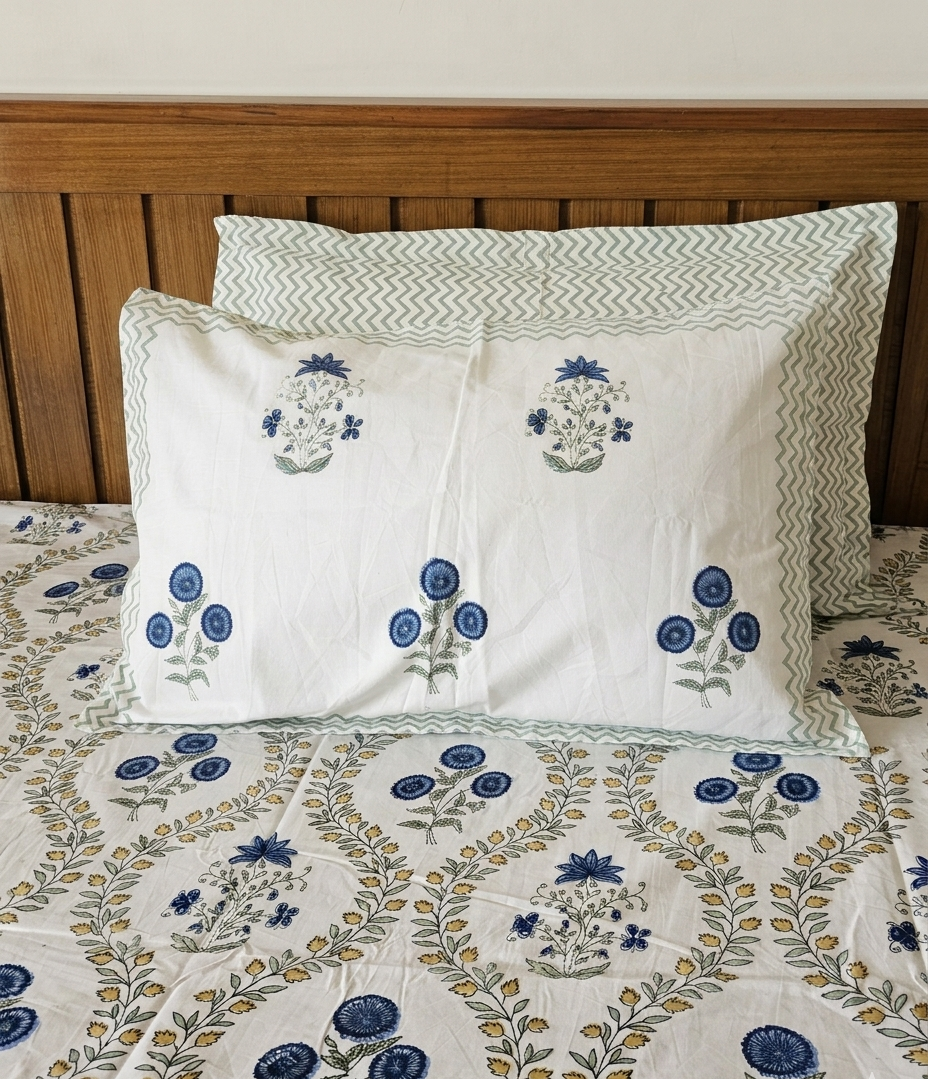LATA 500 TC Arka Luxe Cotton bedsheet highlighting the ivory base, blue floral design, and sage green chevron border.